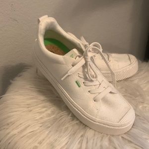 Cariuma white sneakers.
